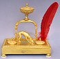 A French bronze inkstand, hound with hare, Empire, c. 1820.